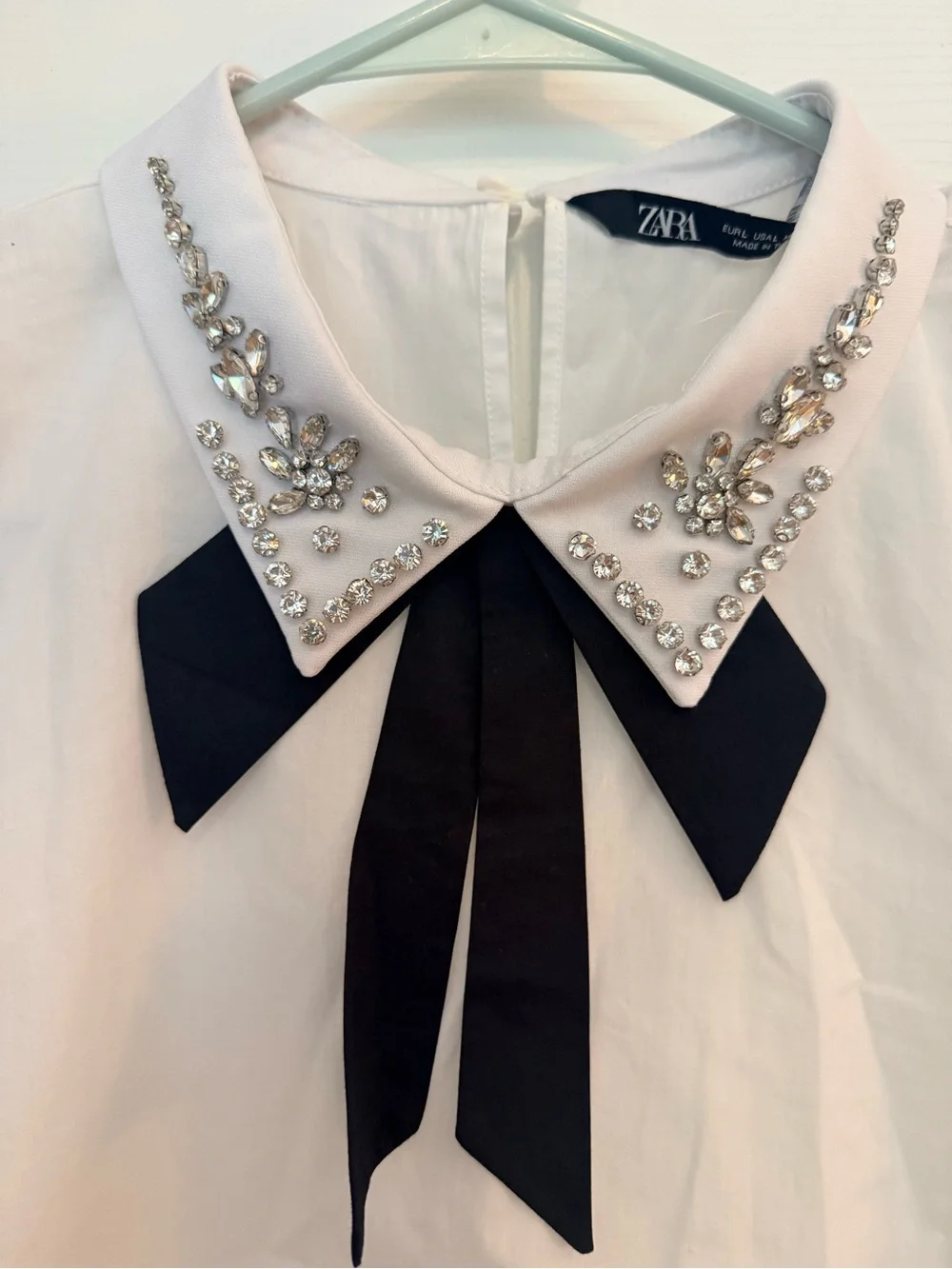 Zara White Puff Sleeve Blouse with Jeweled Collar and Black Ribbon